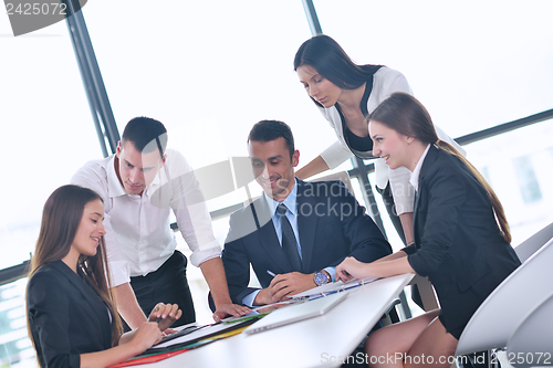 Image of business people in a meeting at office