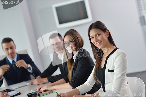Image of business people in a meeting at office