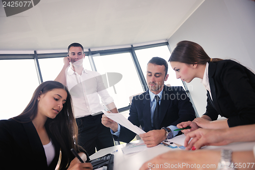 Image of business people in a meeting at office