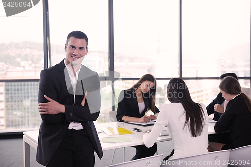 Image of business people in a meeting at office
