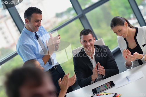 Image of business people in a meeting at office