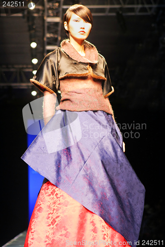 Image of Asian model on the catwalk in traditional South Korean dress (ha