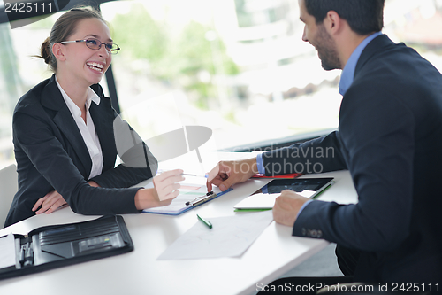 Image of business people in a meeting at office