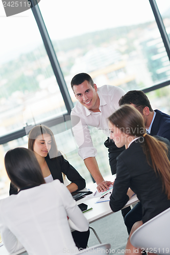 Image of business people in a meeting at office