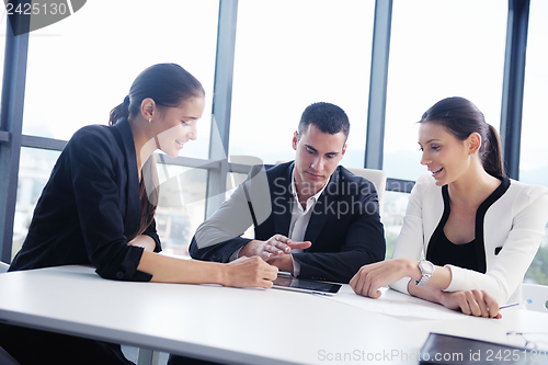 Image of business people in a meeting at office