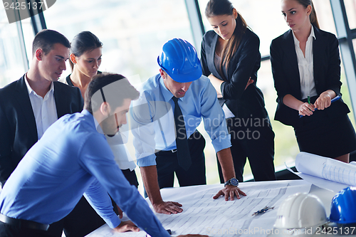 Image of business people and engineers on meeting
