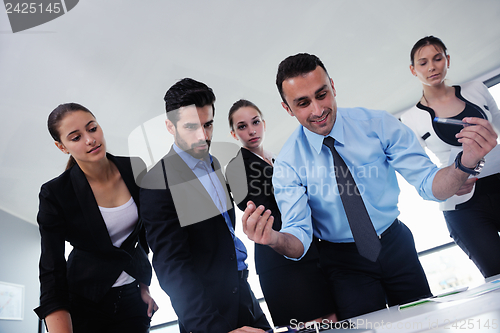 Image of business people in a meeting at office