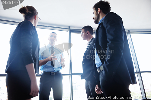 Image of business people in a meeting at office