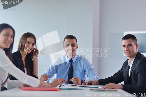 Image of business people in a meeting at office