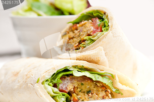 Image of falafel pita bread roll wrap sandwich