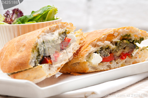 Image of ciabatta panini sandwichwith vegetable and feta