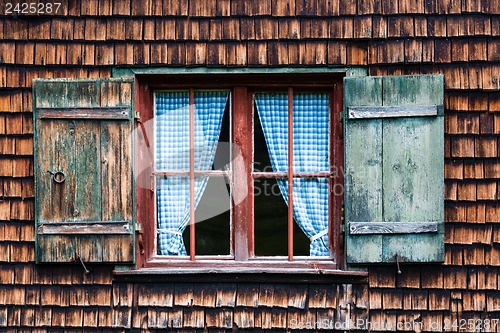 Image of Idyllic Bavarian alpine cottage window