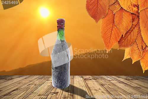 Image of old wine bottle on table