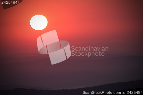 Image of sunset over the hills