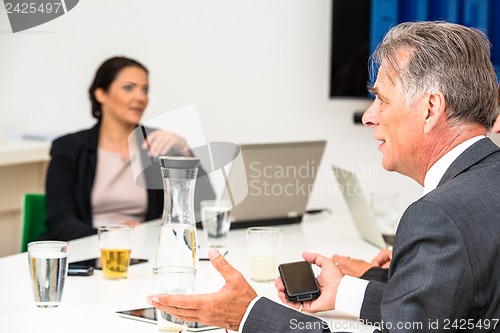 Image of Mixed group in business meeting