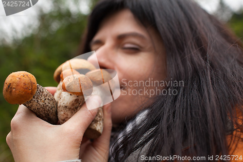 Image of Woman with mushrooms