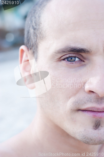 Image of Half face of a handsome man