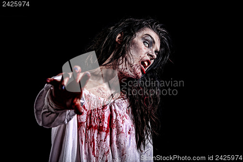 Image of Psychotic Bleeding Woman in a Horror Themed Image