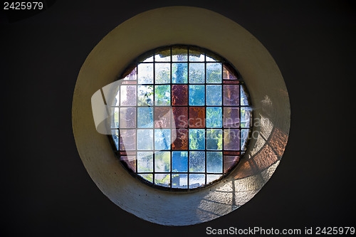 Image of church window with cross