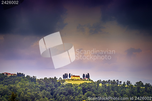 Image of tuscany landscape with dark storm clouds