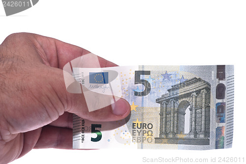 Image of New ticket 5 euros in man hand
