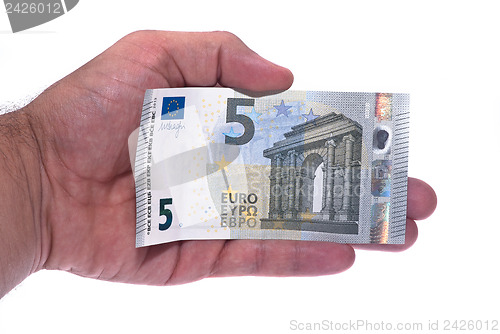 Image of New ticket 5 euros in man hand