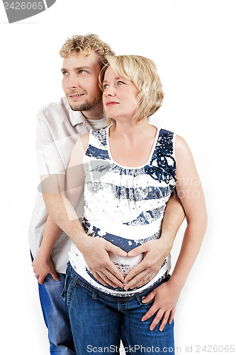 Image of loving happy couple, pregnant woman with her husband, isolated on white