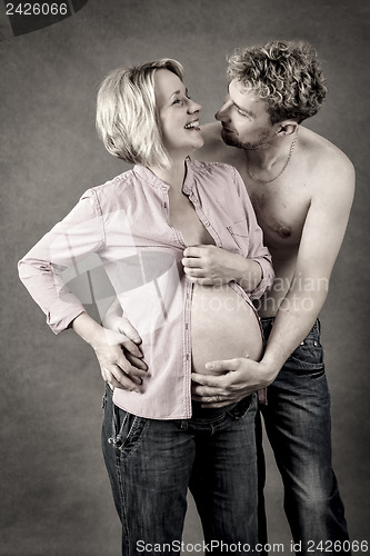 Image of Loving happy couple, pregnant woman with her husband