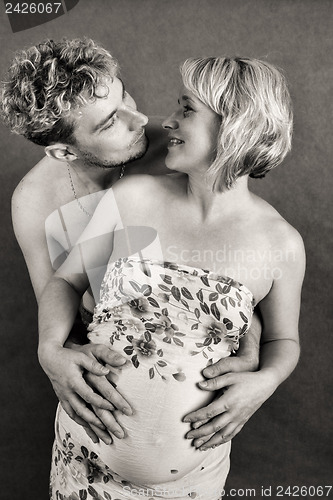 Image of Loving happy couple, pregnant woman with her husband