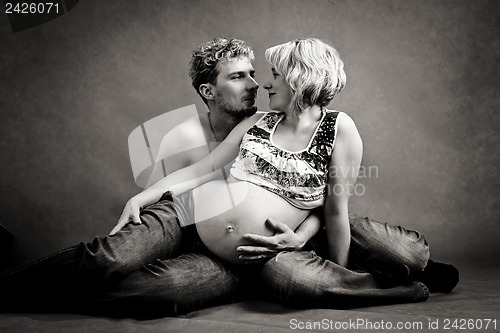Image of Loving happy couple, pregnant woman with her husband