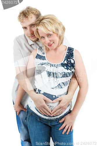 Image of loving happy couple, pregnant woman with her husband, isolated on white