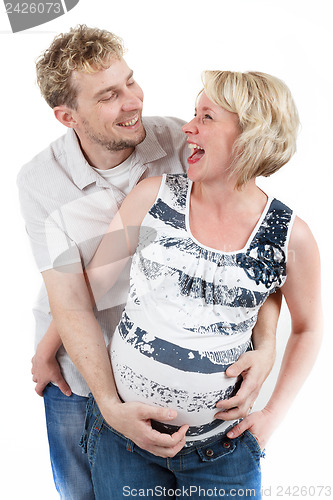 Image of loving happy couple, smiling pregnant woman with her husband