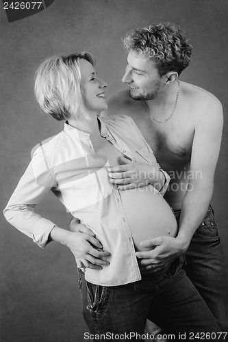 Image of Loving happy couple, pregnant woman with her husband