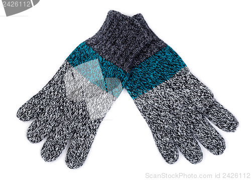 Image of knitted gloves on white background