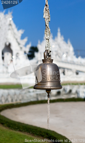 Image of bell on the front of the White Temple Chiang Mai