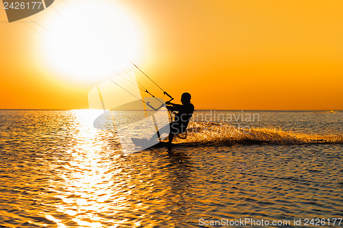 Image of Silhouette of a kitesurfer