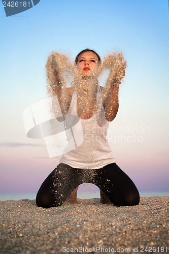 Image of Young woman sitting