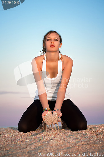 Image of Young woman in white t-shirt