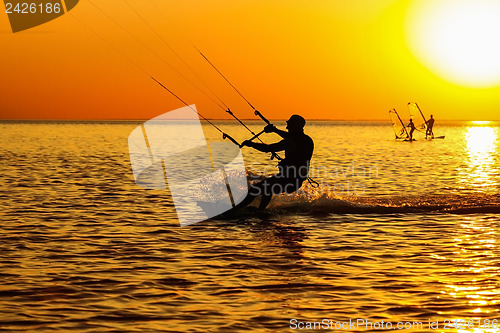 Image of Silhouettes of a windsurfers