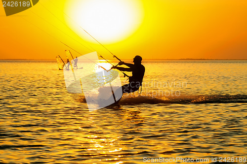 Image of Silhouettes of a windsurfers