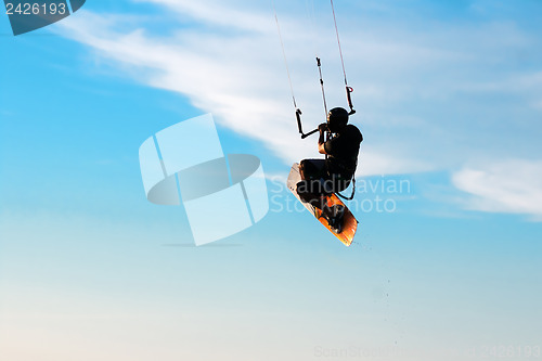 Image of Silhouette of a kitesurfer