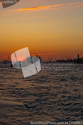 Image of Venice Italy sunset with cruise boat