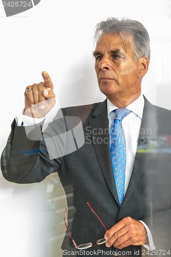 Image of pointing on glass