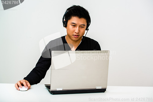 Image of Asian business man with headset