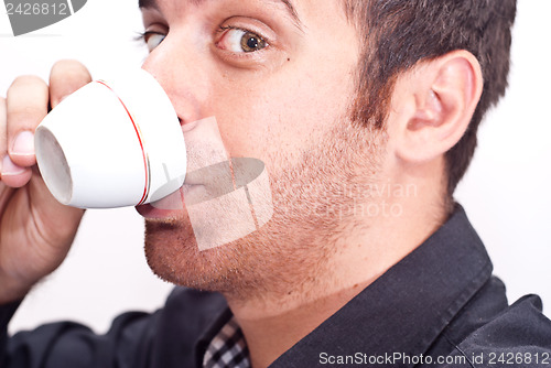 Image of businessman drinking coffee