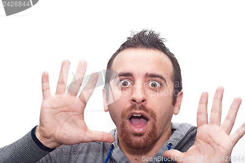 Image of young amazed man portrait