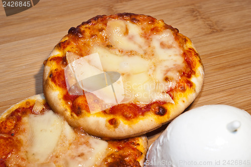 Image of mini pizza with mozzarella