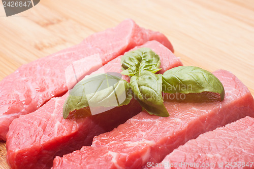 Image of Raw beef on cutting board