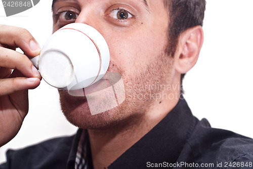 Image of businessman drinking coffee