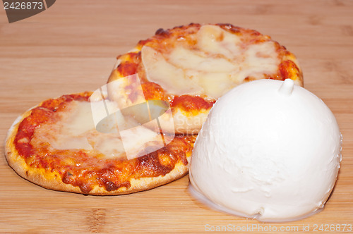 Image of mini pizza with mozzarella